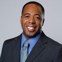 headshot image of Jerry Simons