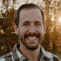 headshot image of Kenny Scheer