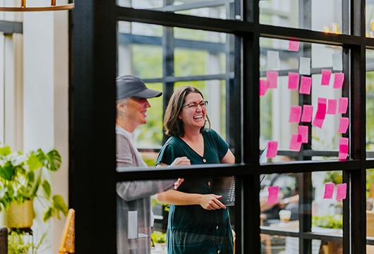 employees working and talking together